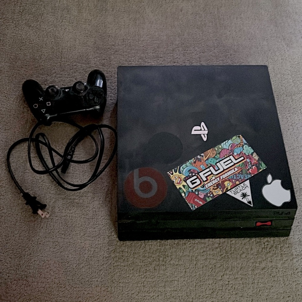 PS4 Pro w/ power cord & controller